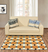 Modern geometric area rug in orange, beige, grey, and navy